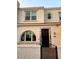 Attractive home front featuring a tiled doorway, arched window and lovely desert color palette at 4077 S Sabrina Dr # 94, Chandler, AZ 85248