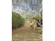 Backyard features a covered patio and gravel landscaping at 5601 E Monte Cristo Ave, Scottsdale, AZ 85254