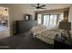 Spacious primary bedroom with a sitting area and a large window to the backyard at 5601 E Monte Cristo Ave, Scottsdale, AZ 85254