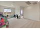 Bright loft area with a play area and a window view, providing versatile space for Gathering activities at 608 E Pasaro Dr, Phoenix, AZ 85085