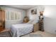 Comfortable bedroom with bright shutters and simple decor at 6118 N 12Th Pl # 2, Phoenix, AZ 85014