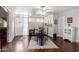 Elegant dining room with hardwood flooring, ceiling fan, and adjacent living spaces, for easy entertaining at 6118 N 12Th Pl # 2, Phoenix, AZ 85014
