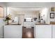 Bright kitchen showcasing white cabinetry, providing a view of the appliances and open floor plan at 6118 N 12Th Pl # 2, Phoenix, AZ 85014