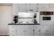 Bright kitchen showcasing vintage oven and stove top alongside classic white cabinets and hardware at 6118 N 12Th Pl # 2, Phoenix, AZ 85014