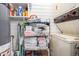 Storage solutions in laundry room including shelving, stacked washer dryer at 6118 N 12Th Pl # 2, Phoenix, AZ 85014
