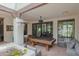 Bright and spacious game room featuring a pool table and outdoor access at 6278 N 31St Way, Phoenix, AZ 85016