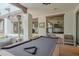 Entertaining game room with a pool table, windows, and view to a patio area at 6278 N 31St Way, Phoenix, AZ 85016