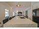 Modern kitchen island with quartz countertops, sleek appliances, and open layout to the living room at 6278 N 31St Way, Phoenix, AZ 85016