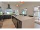 Spacious kitchen featuring a large island, modern appliances, and sleek black and white cabinetry at 6278 N 31St Way, Phoenix, AZ 85016
