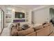 Cozy living room with built-in shelves, a modern fireplace, and comfortable seating at 6278 N 31St Way, Phoenix, AZ 85016