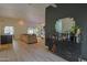 Bright and airy living space with bar area, open layout, and seamless transition to another room at 6278 N 31St Way, Phoenix, AZ 85016