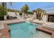 Stunning pool area with a spa, water feature, and outdoor seating, creating an idyllic retreat at 6278 N 31St Way, Phoenix, AZ 85016
