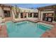 Stunning backyard pool area with a unique design and lush landscaping at 6278 N 31St Way, Phoenix, AZ 85016