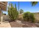 Private backyard featuring desert landscaping, including a large Saguaro cactus and decorative gravel at 8361 E Via De Viva --, Scottsdale, AZ 85258