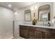 Modern bathroom features a tiled walk-in shower, dual sinks, and stylish fixtures at 8361 E Via De Viva --, Scottsdale, AZ 85258