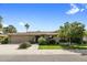 Charming single-story home with a well-maintained front yard, mature trees, and a two-car garage at 8361 E Via De Viva --, Scottsdale, AZ 85258
