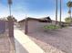 Charming single-story home with stucco walls and desert landscaping at 930 S Acapulco Ln # D, Tempe, AZ 85281
