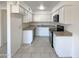 Bright kitchen with white cabinets and modern appliances at 930 S Acapulco Ln # D, Tempe, AZ 85281