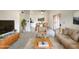 Bright living room featuring stylish furniture and neutral decor at 930 S Acapulco Ln # D, Tempe, AZ 85281