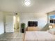 Cozy bedroom with a dresser and ensuite bathroom at 930 S Acapulco Ln # D, Tempe, AZ 85281