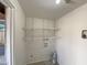Storage room with installed wire shelving, providing ample space for organizing household items at 930 S Acapulco Ln # D, Tempe, AZ 85281