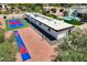 Aerial view of home with a blue pickleball court, and shuffleboard at 10620 N 84Th St, Scottsdale, AZ 85260