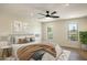 Inviting bedroom with a large bed, area rug, and natural light at 10620 N 84Th St, Scottsdale, AZ 85260
