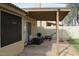 Inviting covered patio perfect for relaxing or entertaining outdoors at 1132 E Harbor View Dr, Gilbert, AZ 85234