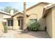 Attractive home entrance with desert landscaping, a secure door, and a walkway leading to the front door at 1132 E Harbor View Dr, Gilbert, AZ 85234