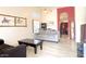 Inviting living room featuring vaulted ceilings and open space with comfortable seating, perfect for entertaining at 1132 E Harbor View Dr, Gilbert, AZ 85234