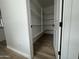 Walk-in pantry with ample shelving, providing abundant storage space for all your kitchen needs at 15786 W Cheryl Dr, Waddell, AZ 85355