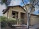Two-story home featuring a neutral stucco exterior, tile roof, and a well-maintained front yard at 4152 S 249Th Dr, Buckeye, AZ 85326