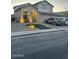 Well-maintained two-story home with manicured front yard and ample parking on a quiet street at 4152 S 249Th Dr, Buckeye, AZ 85326
