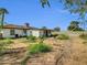 Back exterior of home featuring a fenced in backyard with various trees at 10245 N 15Th Dr, Phoenix, AZ 85021