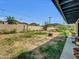 Fenced backyard featuring a patio and various shrubbery at 10245 N 15Th Dr, Phoenix, AZ 85021