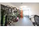 A spacious home gym featuring exercise equipment and ample space for fitness activities at 10423 E Verbena Ln, Scottsdale, AZ 85255