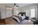 Spacious main bedroom with plenty of natural light and a ceiling fan at 10423 E Verbena Ln, Scottsdale, AZ 85255