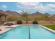 Stunning pool with mountain views and a desert landscape, offering a serene outdoor escape at 10423 E Verbena Ln, Scottsdale, AZ 85255