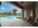 Covered patio area overlooking pool and spa with nice desert landscaping at 10423 E Verbena Ln, Scottsdale, AZ 85255