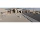 Contemporary home design with a spacious driveway and modern accents, set in desert landscape at 12053 W Palo Brea Ln, Peoria, AZ 85383
