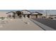 Modern farmhouse-style home with a large front yard and three-car garage at 12053 W Palo Brea Ln, Peoria, AZ 85383