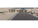 Newly built home with a three-car garage, neutral tones, and a large driveway at 12053 W Palo Brea Ln, Peoria, AZ 85383