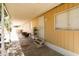 Relaxing covered porch with ample seating, providing a cozy outdoor living space at 1524 E 23Rd Ave, Apache Junction, AZ 85119