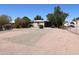 Inviting home showcasing a spacious yard perfect for outdoor activities and relaxation at 1524 E 23Rd Ave, Apache Junction, AZ 85119