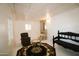 Bright living room featuring neutral walls and flooring with a patterned rug at 1524 E 23Rd Ave, Apache Junction, AZ 85119