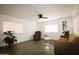 Bright living room with modern flooring, neutral walls and an abundance of natural light at 1524 E 23Rd Ave, Apache Junction, AZ 85119