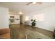 Bright and airy living space featuring a kitchen, dining area, and large windows at 1524 E 23Rd Ave, Apache Junction, AZ 85119