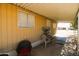 Covered patio area with exterior seating and view of the property at 1524 E 23Rd Ave, Apache Junction, AZ 85119