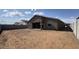 Spacious backyard area surrounded by a block fence, awaiting personalization at 15777 W Cheryl Dr, Waddell, AZ 85355