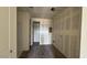 Unfinished bathroom with wood flooring awaiting fixtures offers customization opportunity at 15777 W Cheryl Dr, Waddell, AZ 85355